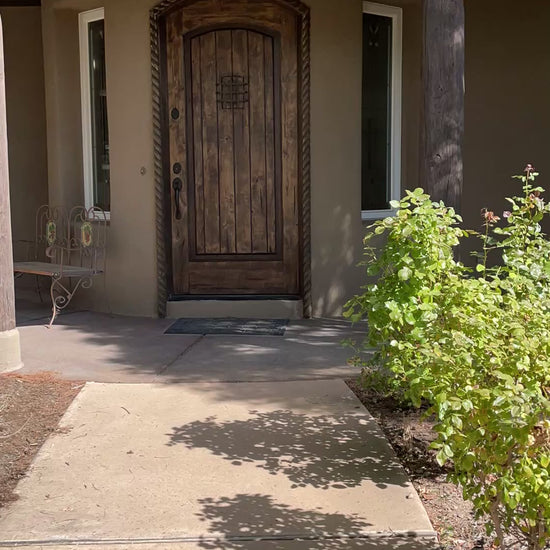 video of harvest hunks decorating a porch with their concierge pumpkin delivery service in Albuquerque, New Mexico